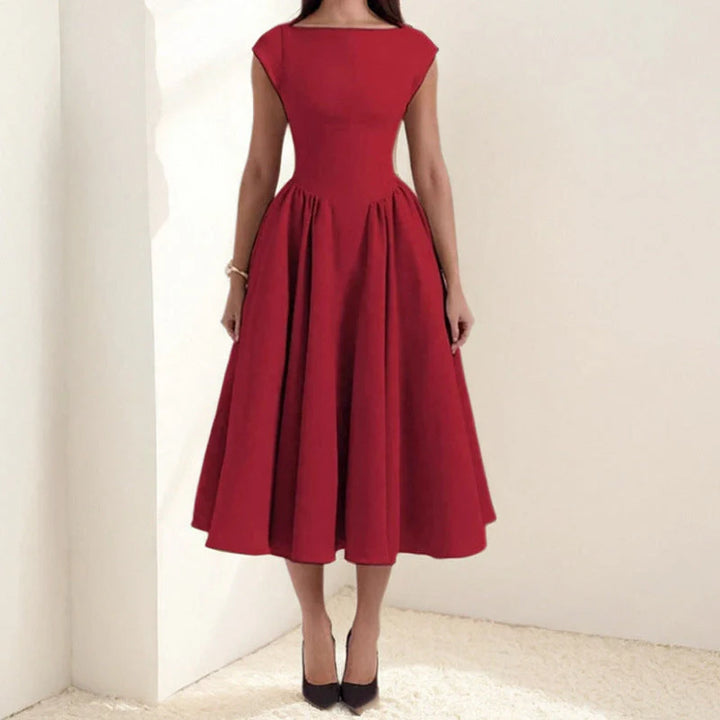 Full-length view of fit and flare midi dress with cap sleeves and round neckline for elegant occasions