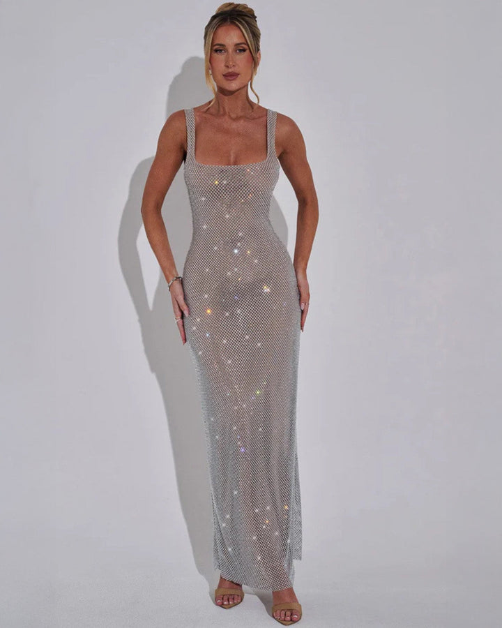 Full-length view of embellished evening gown in burgundy with square neckline and maxi hem