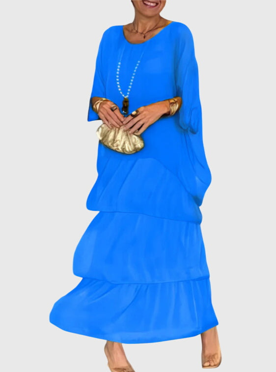 Detail view of dolman sleeve construction and neckline on boho layered dress