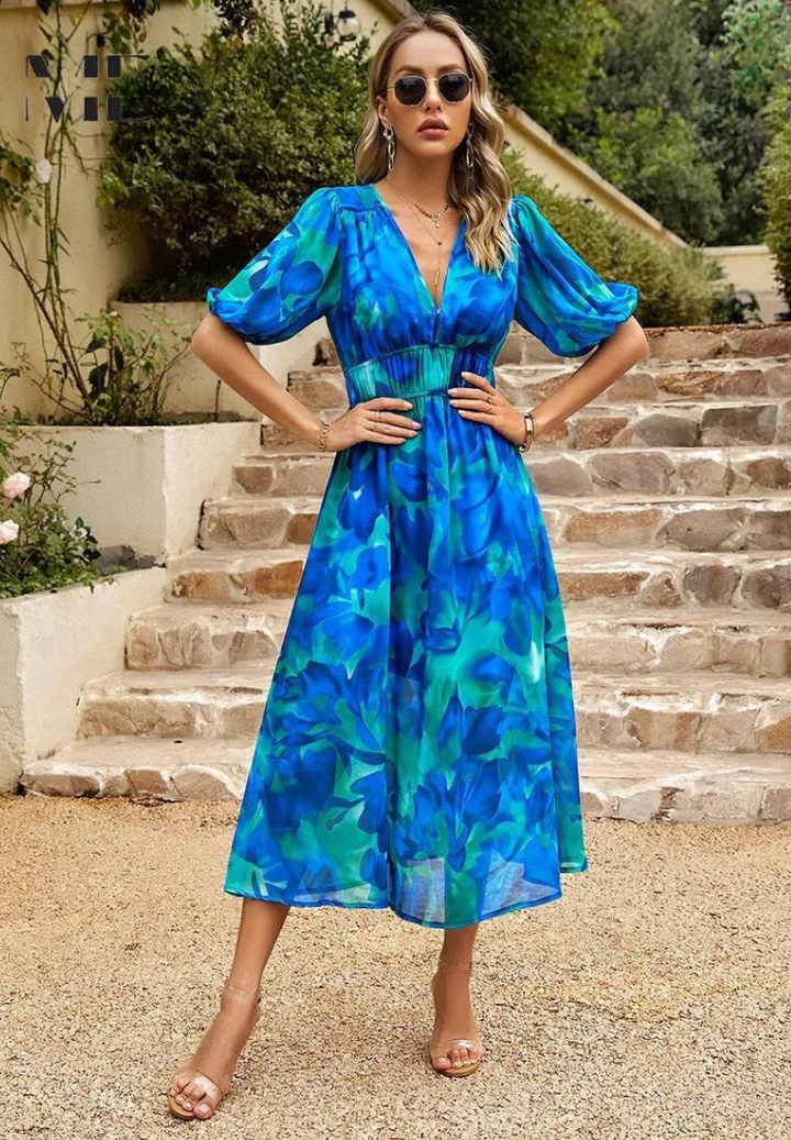 Women's Abstract Print Midi Dress styled with woven clutch and sunglasses for garden party
