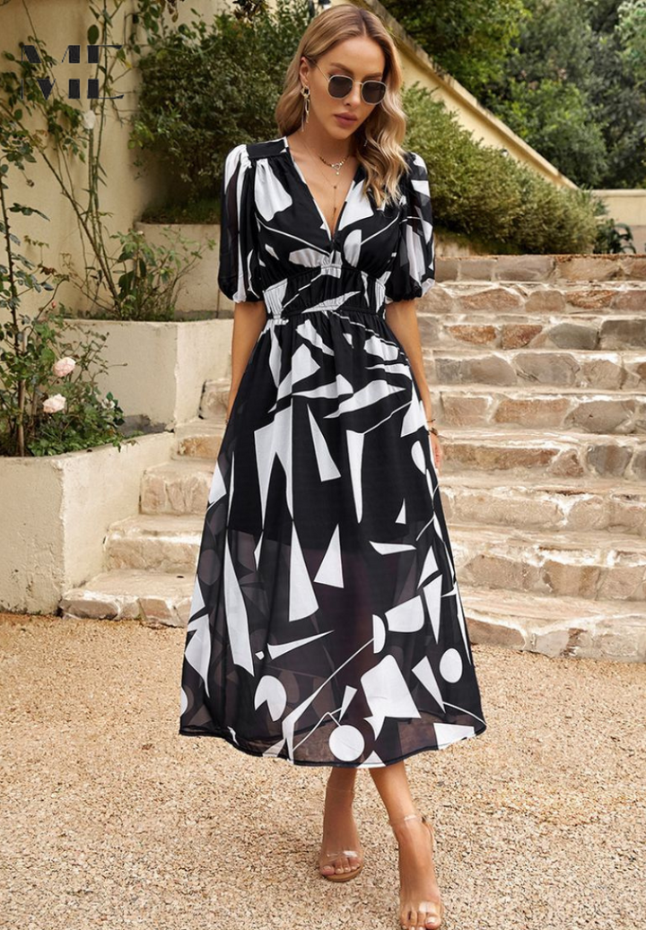 Full silhouette of Women's Abstract Print Midi Dress showing V-neckline and flowing midi-length skirt