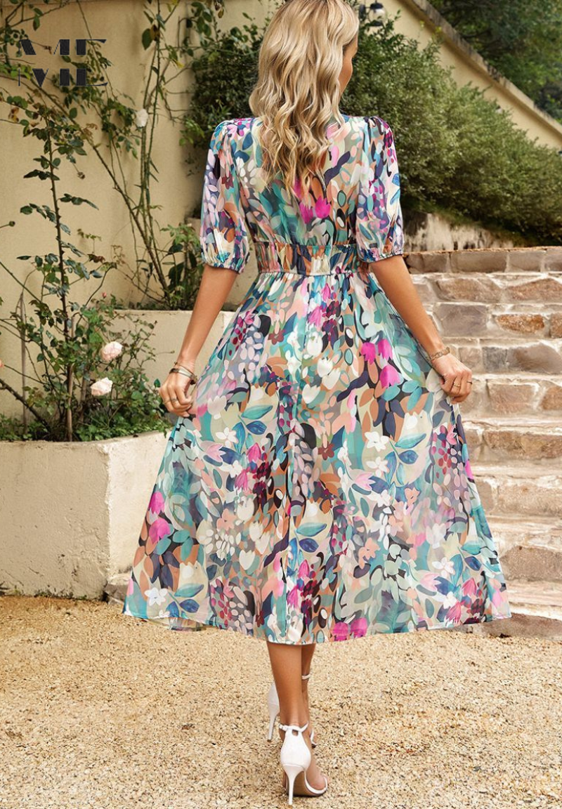 Side view of Women's Abstract Print Midi Dress displaying puff sleeves and flattering silhouette