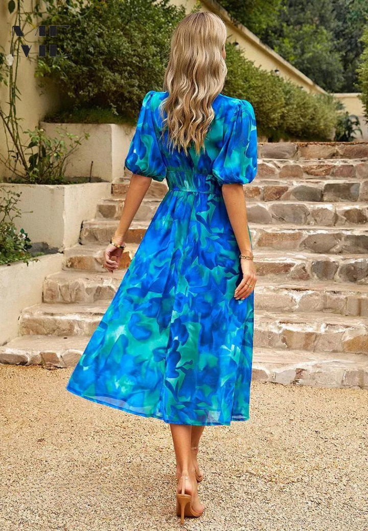 Woman styling Women's Abstract Print Midi Dress with strappy sandals for casual summer look