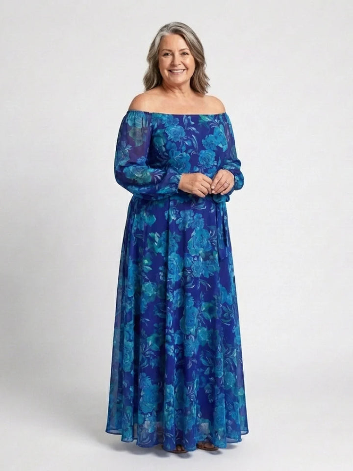Close-up detail of floral print maxi dress showing off-shoulder design and sleeve construction