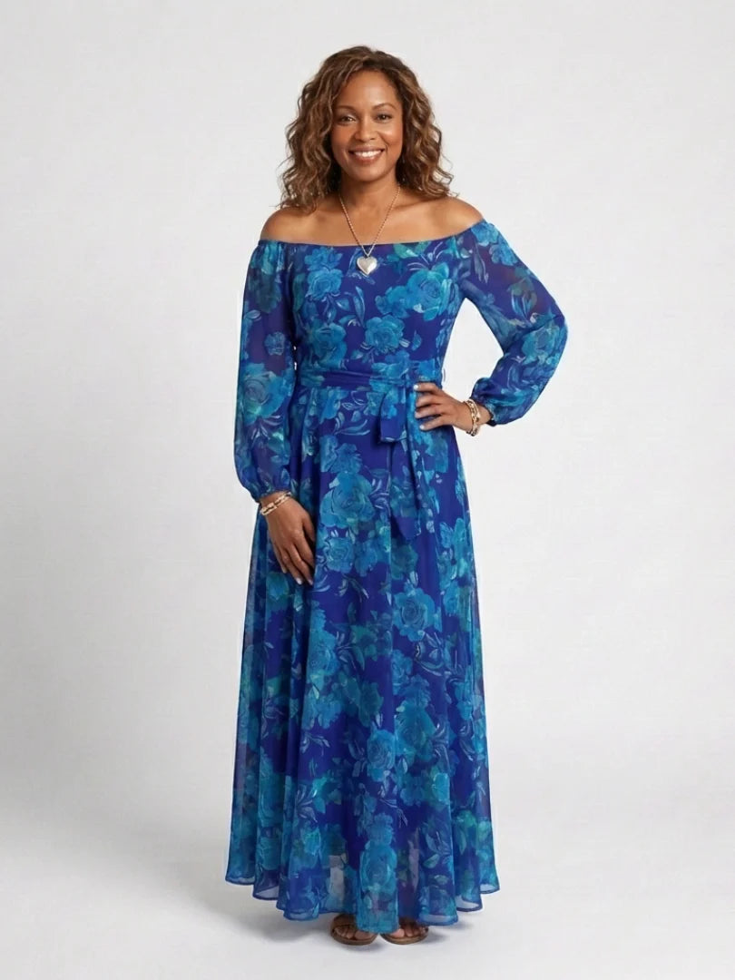 Side view of elegant maxi dress with flattering waist tie and full-length flowing skirt