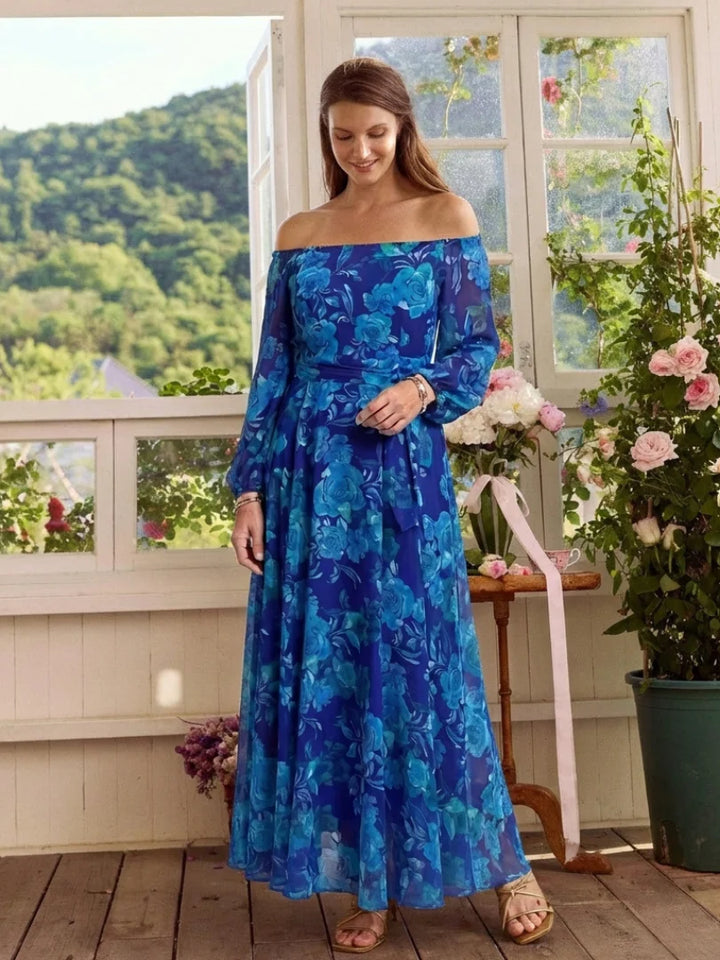 Back view of off-shoulder maxi dress showcasing long sleeves and graceful drape