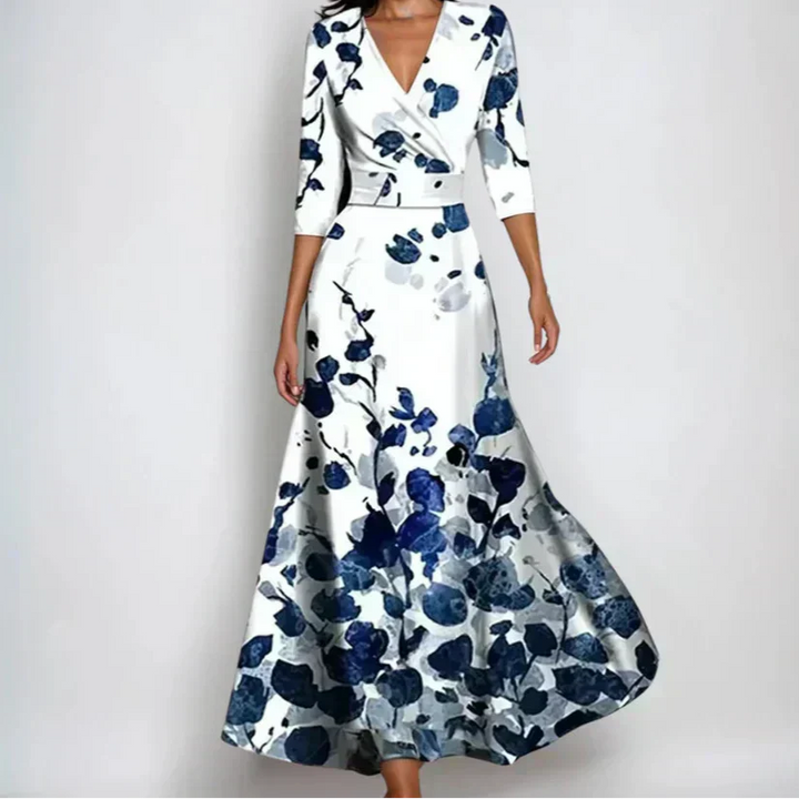 Close-up view of floral wrap maxi dress showing V-neckline and waist tie detail