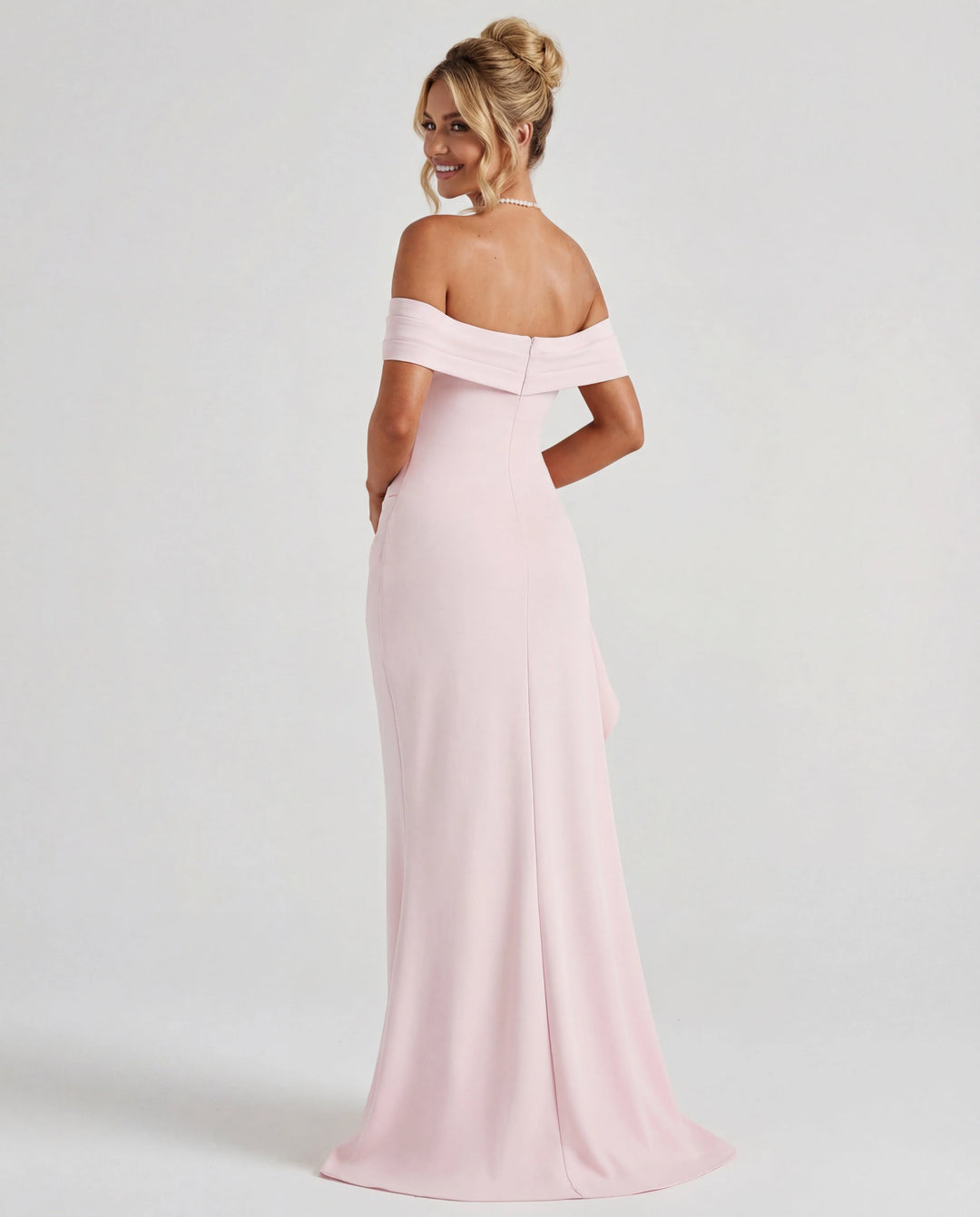 Ruched bodycon maxi dress with off-shoulder neckline and dramatic thigh-high slit detail