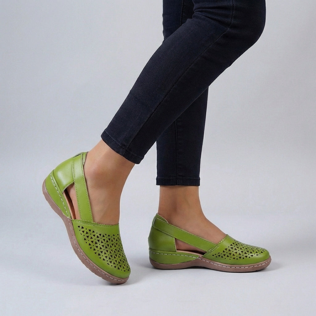 Side angle of Women's Orthopedic Scalloped Sandals showing open side panels and closed-toe design