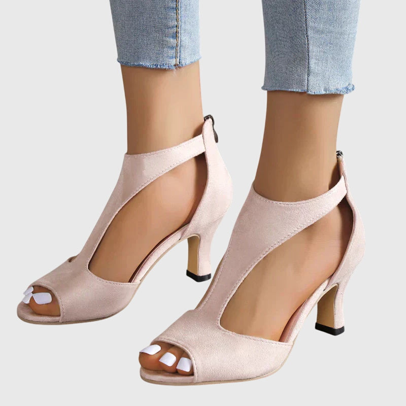Side profile of block heel peep toe sandals displaying chunky heel and supportive ankle wrap design