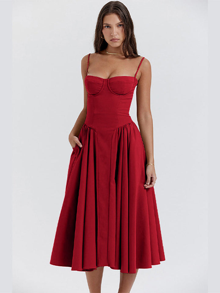 Three-quarter view showing the fitted waist and gathered skirt of midi dress