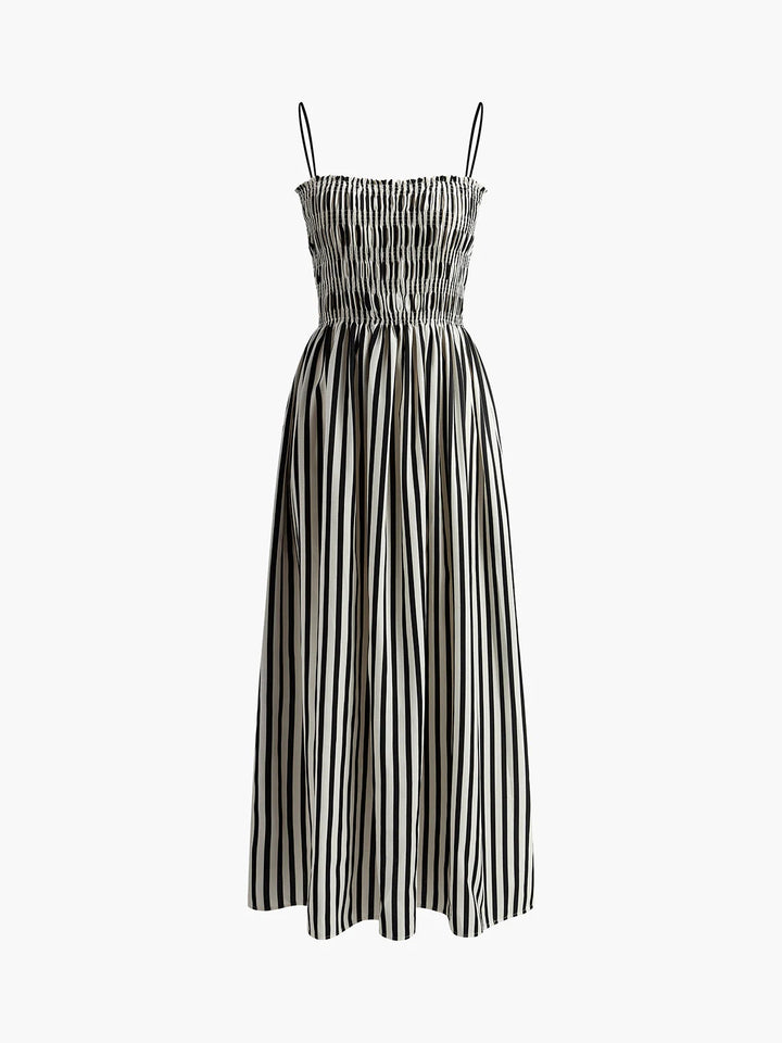 Back view of sleeveless pinstripe long dress revealing open back and adjustable strap detailing