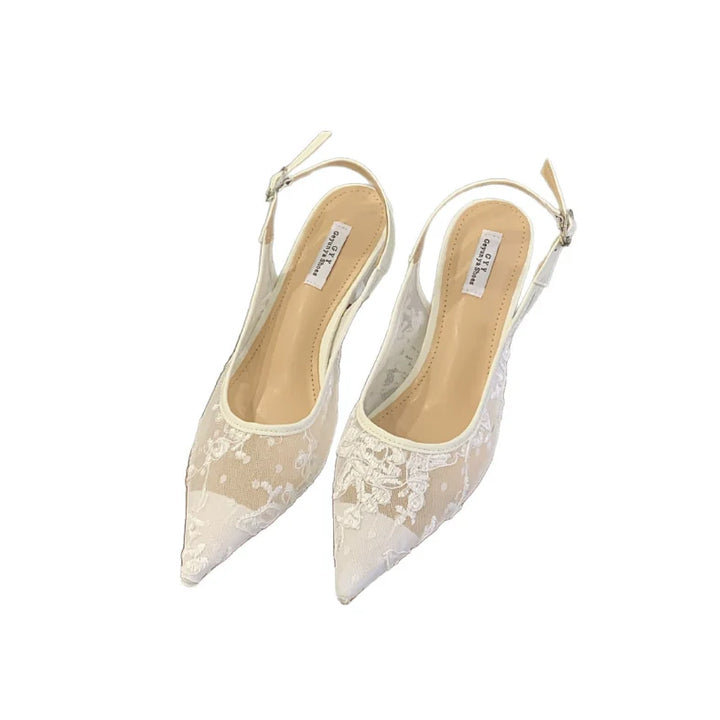 Rear view of slingback heels showing buckle fastening and heel counter design