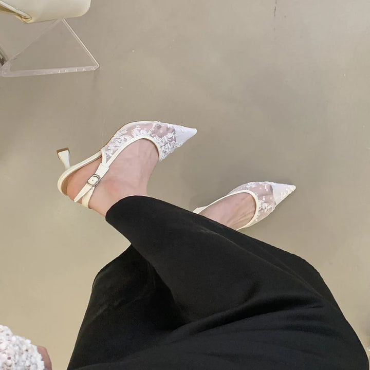 Women's bridal lace slingback heels styled for wedding and formal occasions