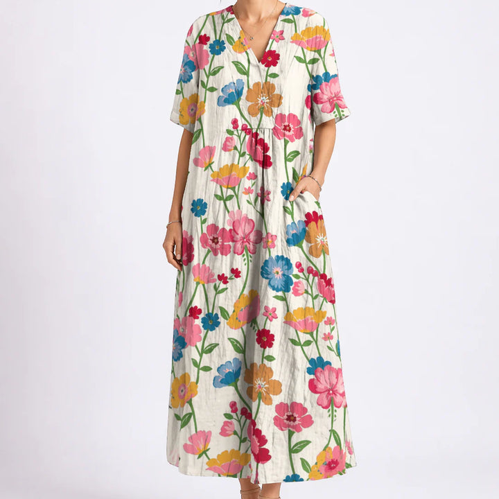 Full-length view of floral midi dress showing relaxed silhouette and drape