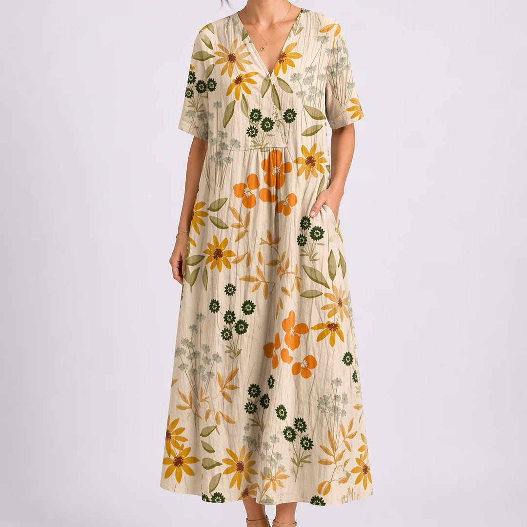 Back view of floral midi dress with flowing skirt and midi length hem