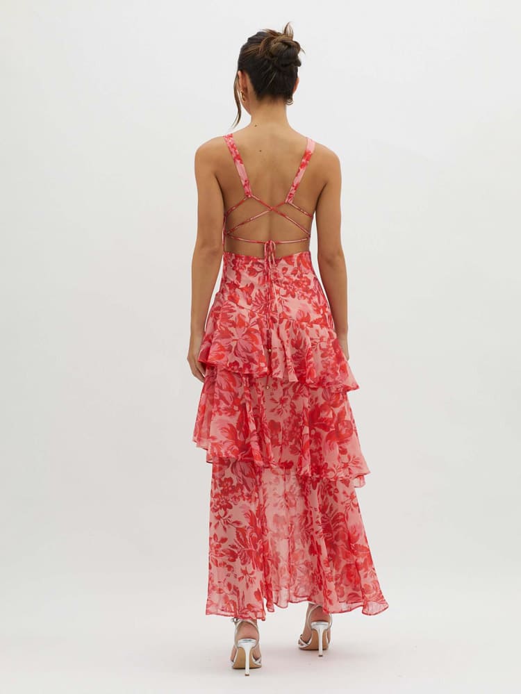 Side view of tiered maxi dress showing flowing layered skirt construction and sleeveless bodice