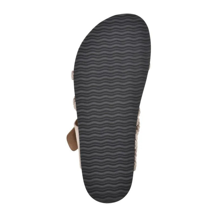 Angled view of toe-loop sandals displaying woven strap detail and textured footbed