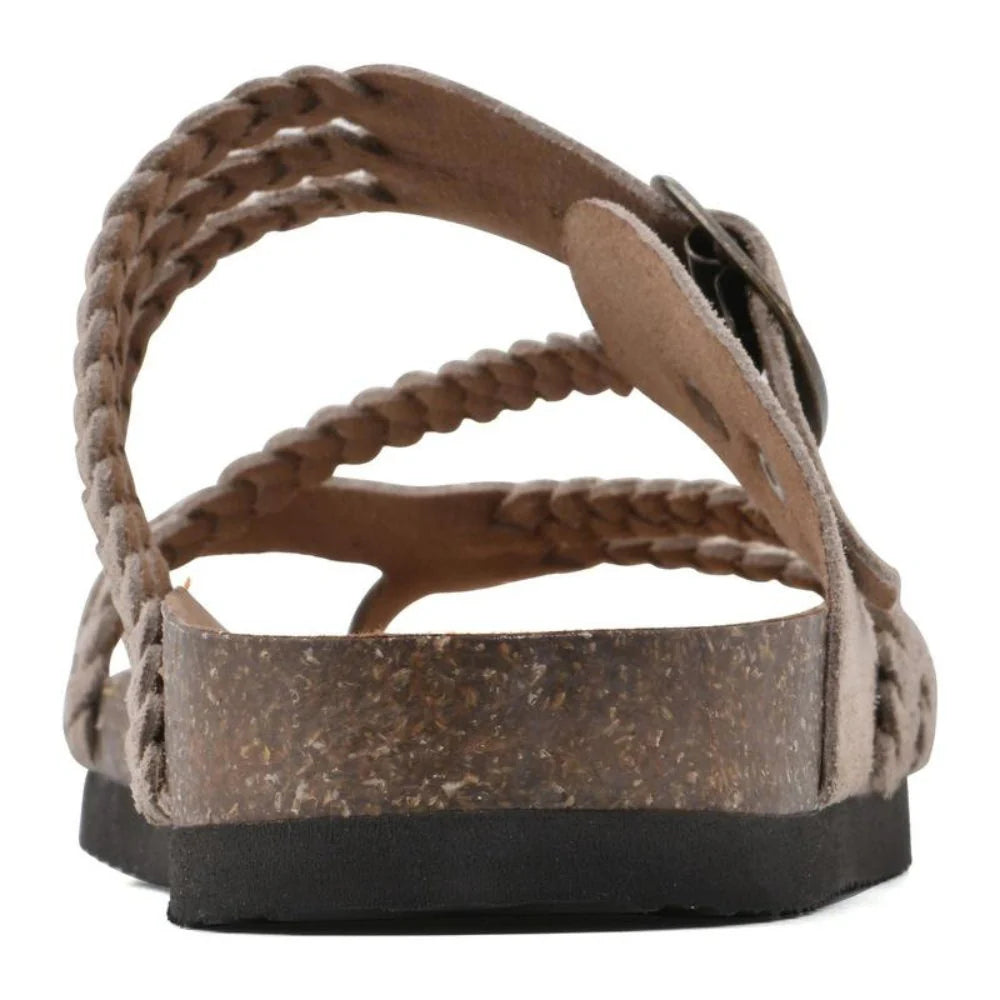 Detail shot of adjustable buckle and plaited leather straps on toe-loop sandals