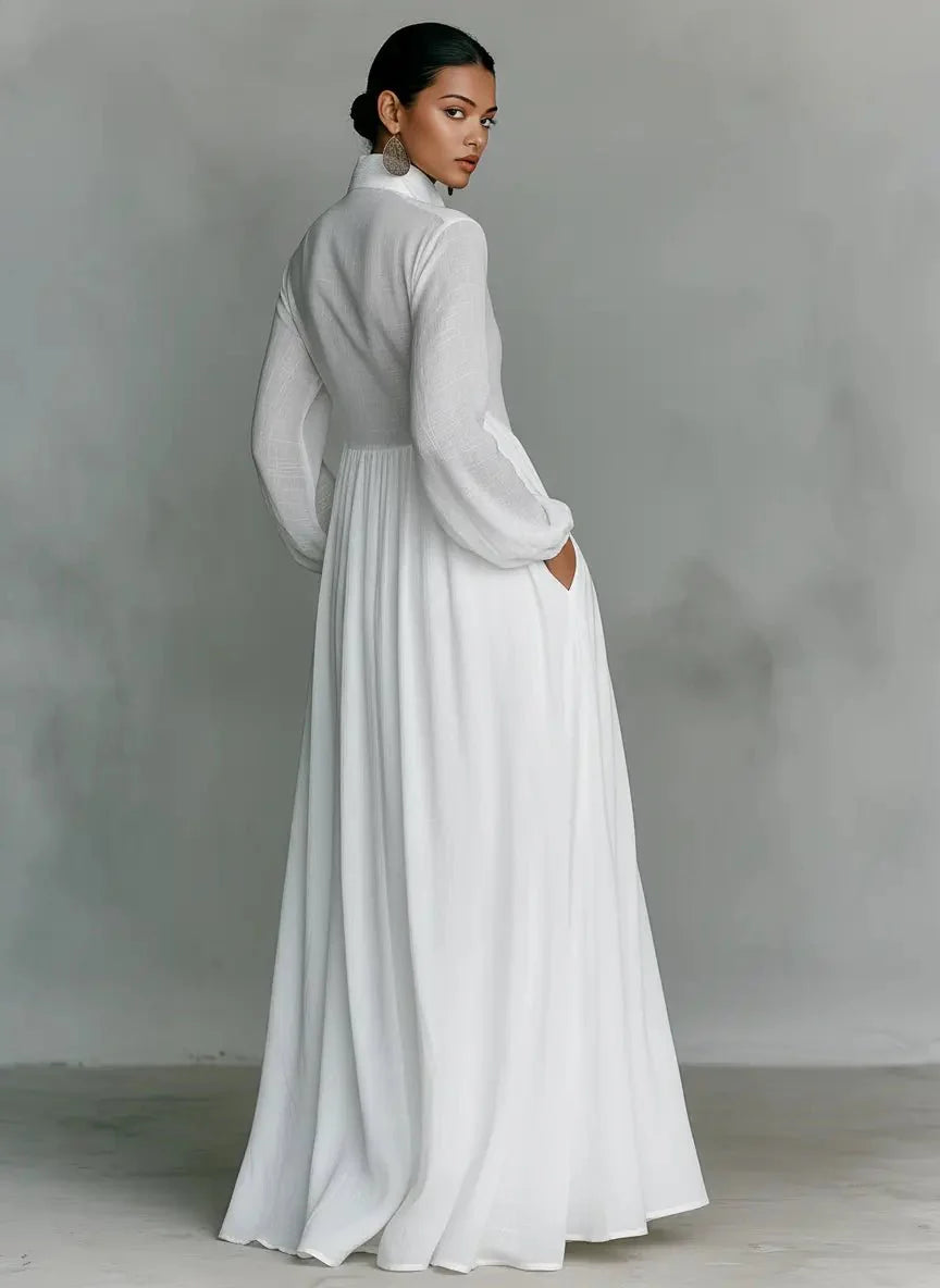 Front view of maxi dress with structured stand-up collar and relaxed fit through bodice and skirt