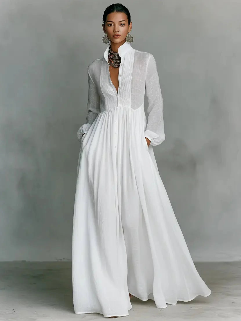 Back view of floor-length maxi dress showing clean lines and button closure from collar to hem