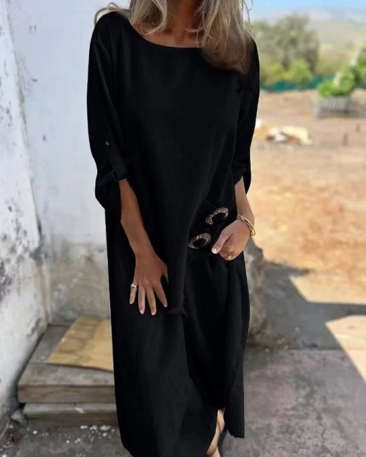 Full-length view of the two-piece set showing the relaxed silhouette and matching trousers