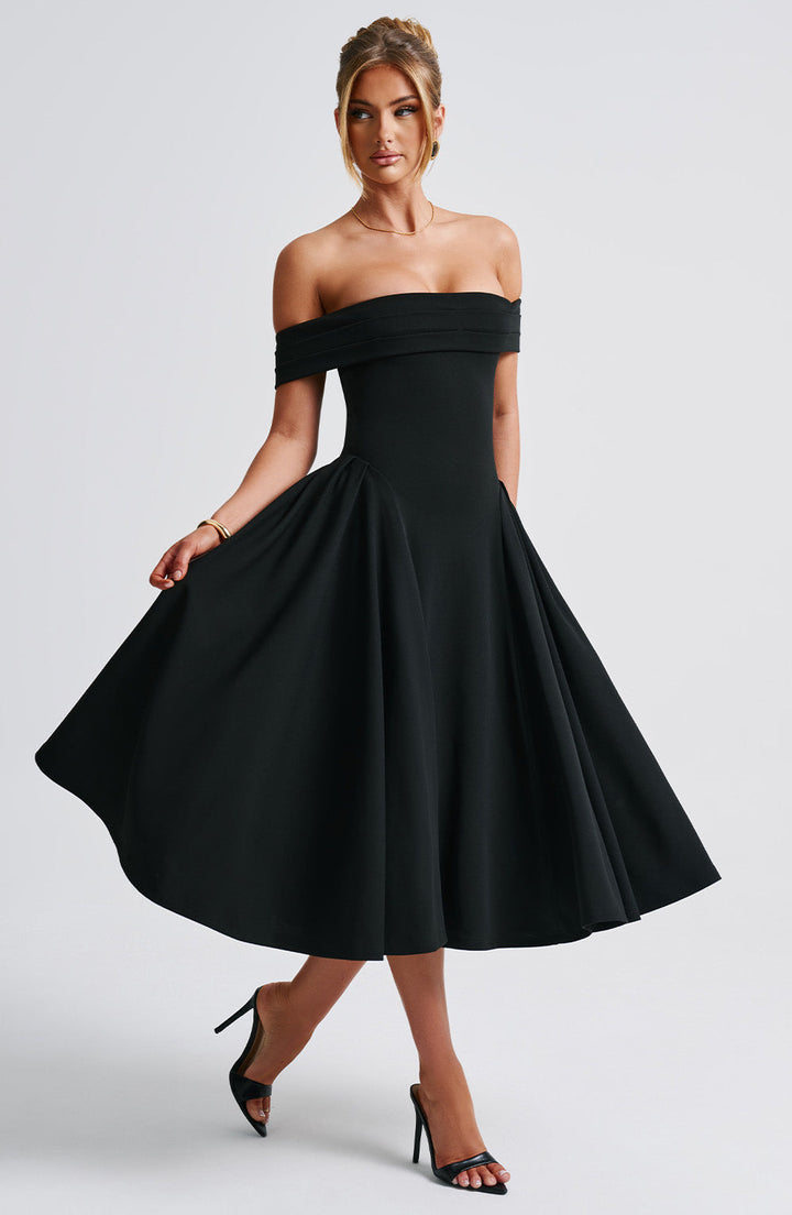 Side view of the Off-Shoulder Flare Midi Dress highlighting the flared skirt and pleated volume