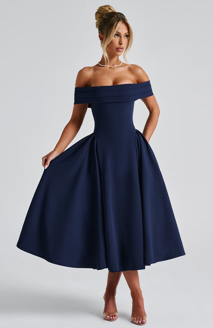 Detail shot of the Off-Shoulder Flare Midi Dress neckline and shoulder framing design