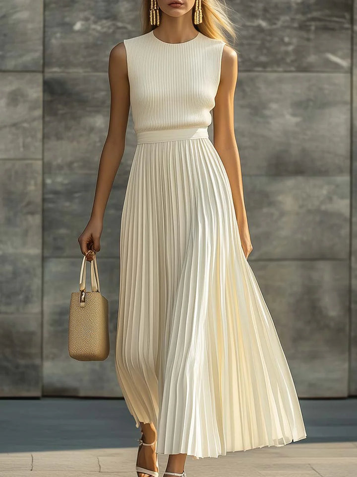Women's Sleeveless Knit Pleated Chiffon Maxi Dress in cream with ribbed knit bodice and flowing pleated skirt