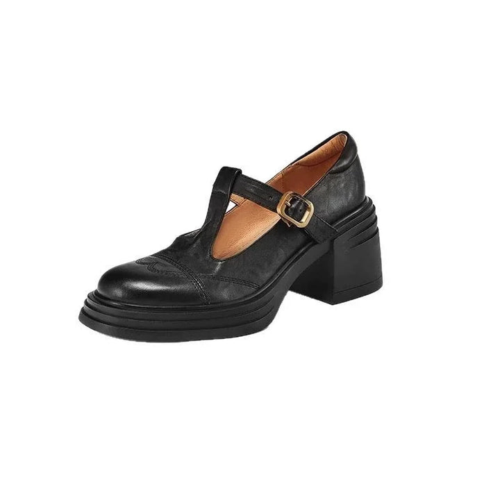 Classic Women's Leather T-Strap Shoes worn with grey skirt, showing heel height and secure fit