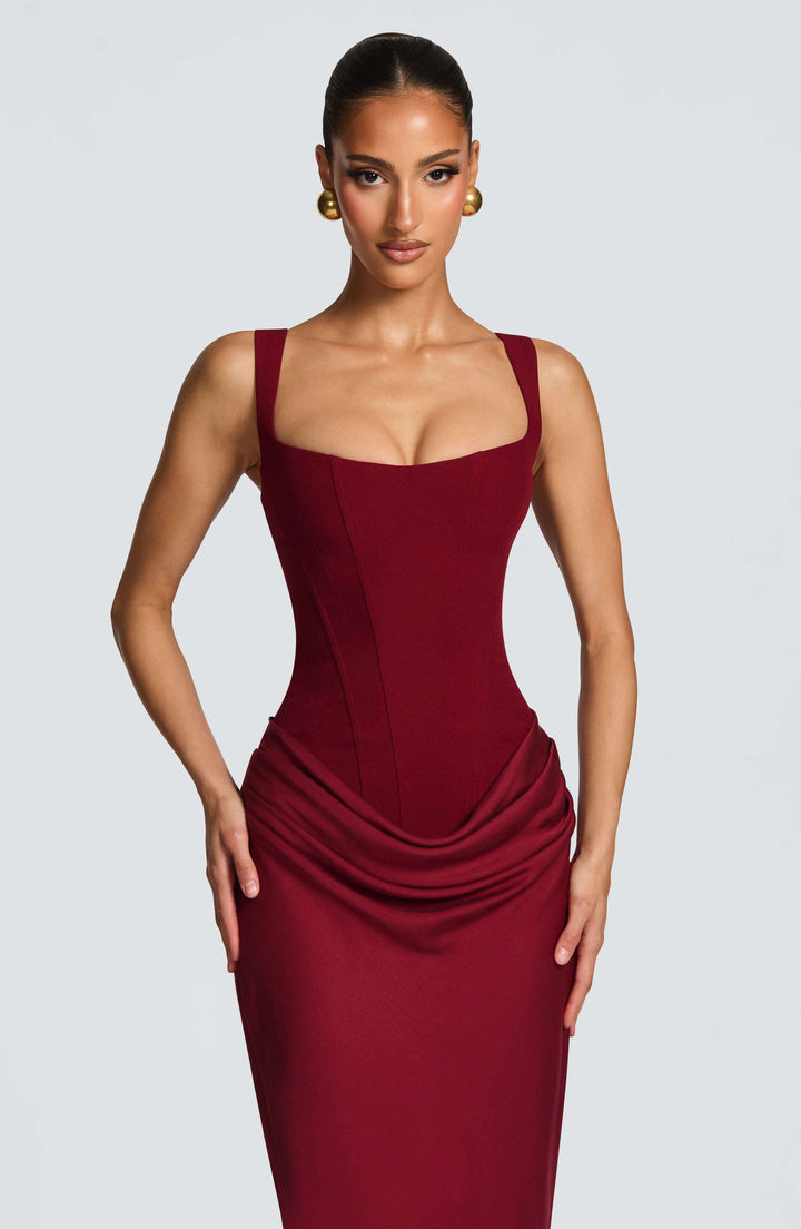 Women's Sleeveless Bodycon Maxi Wedding Guest Dress styled with heels for evening reception