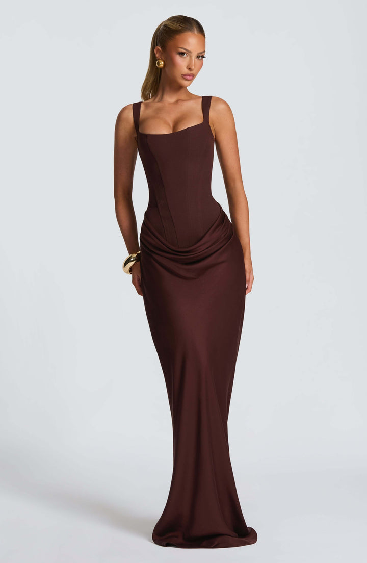 Back view of the sleeveless maxi dress showing the elegant shoulder strap placement