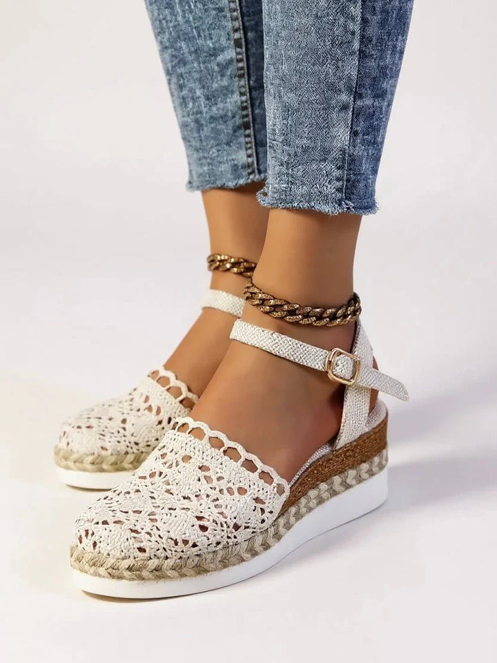 Artisanal crochet platform sandals with espadrille detailing and secure ankle strap closure