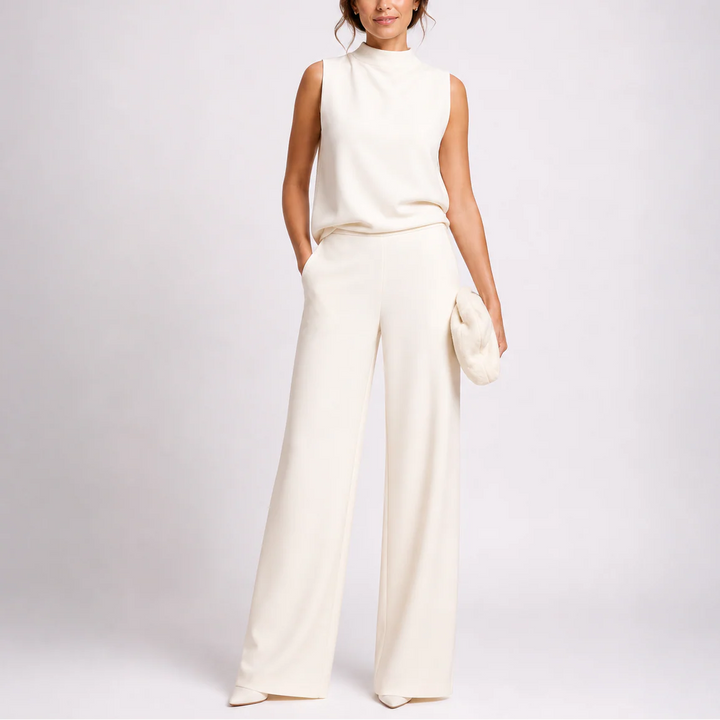 Front view of sleeveless jumpsuit showing structured fabric and wide-leg silhouette