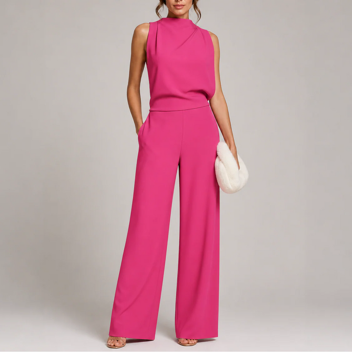 Detail of sleeveless design and smooth fabric finish on one-piece jumpsuit