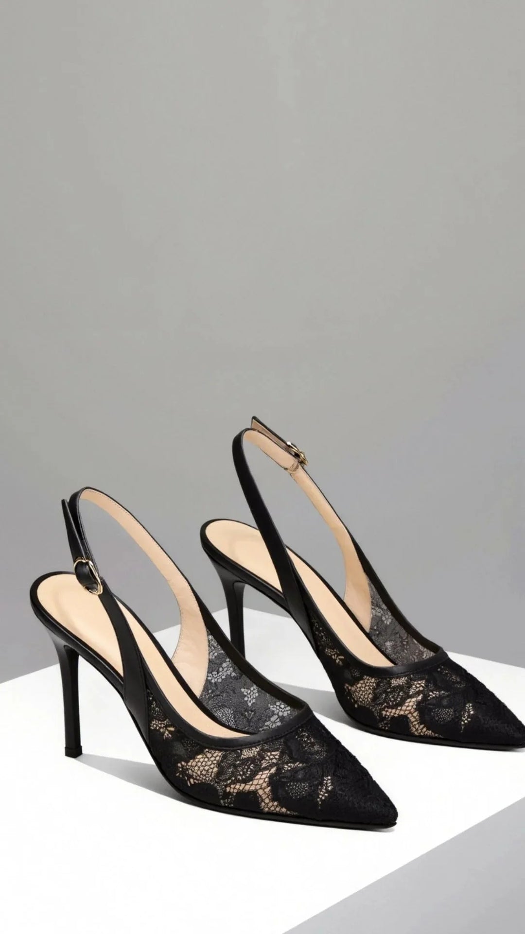 Detail shot of pointed toe and lace-inspired texture on women's slingback heels