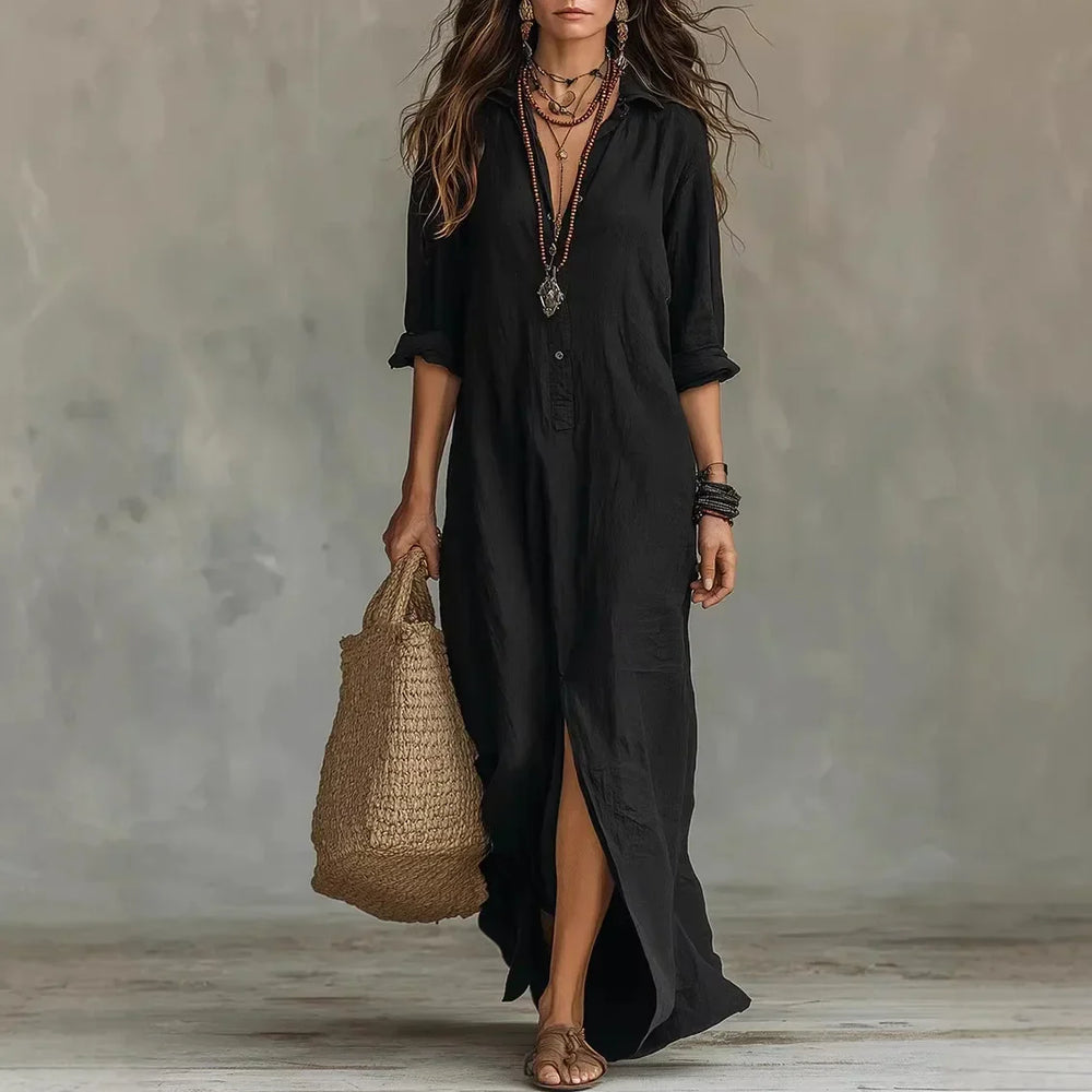 Relaxed linen shirt dress with three-quarter sleeves and flowing maxi silhouette