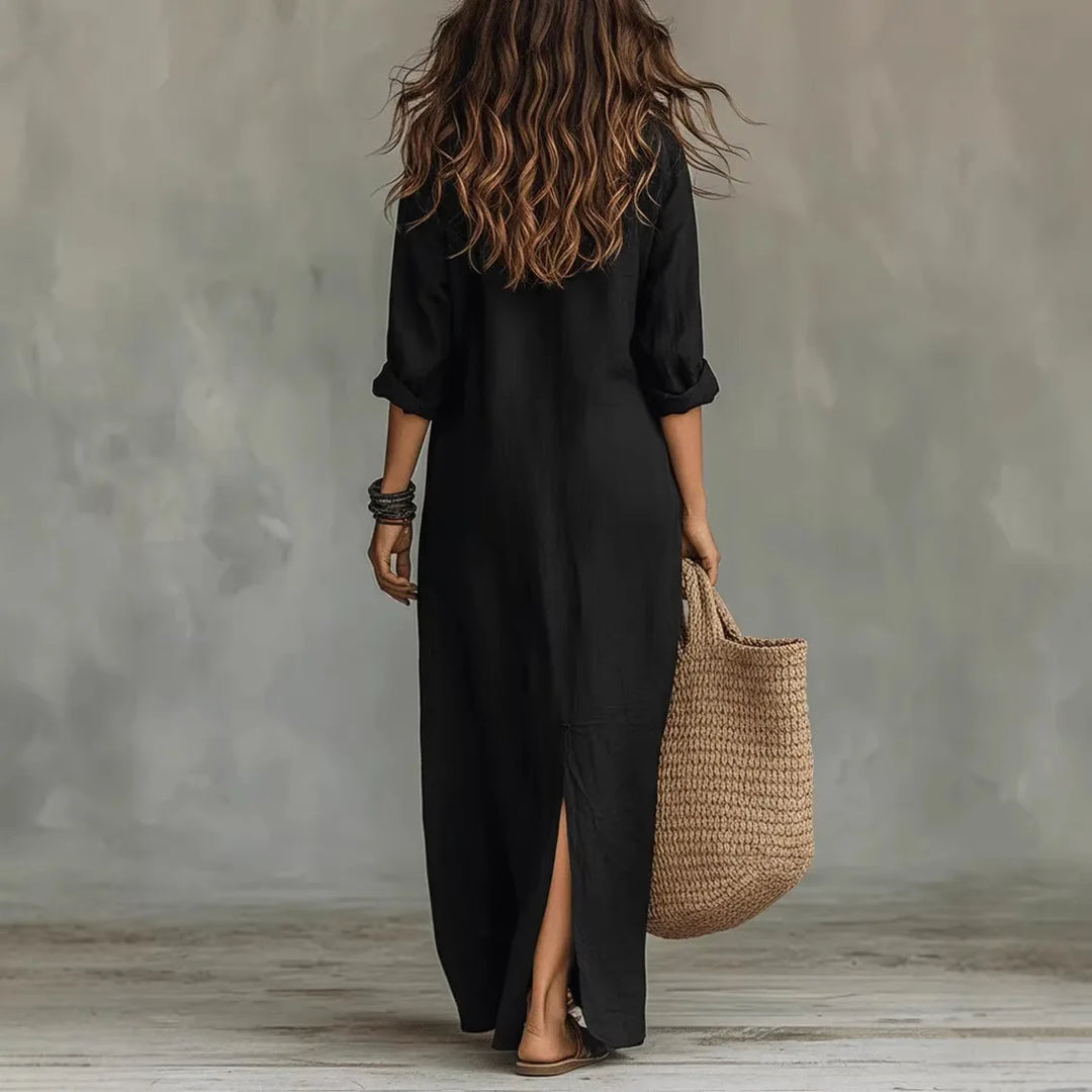 White linen maxi shirt dress styled with woven tote and sandals