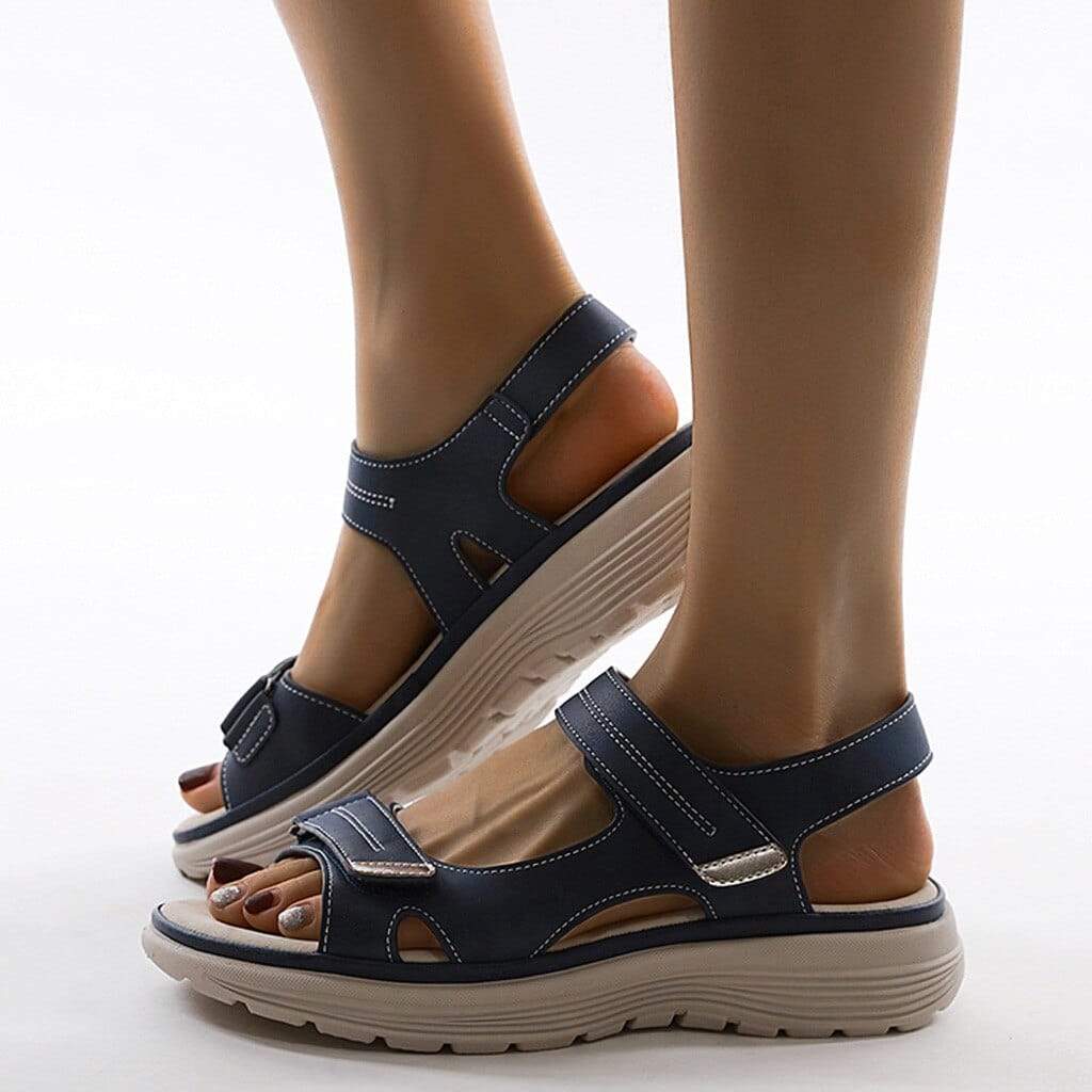 Side profile of orthopaedic walking sandals with arch support highlighting the cushioned footbed and ergonomic construction