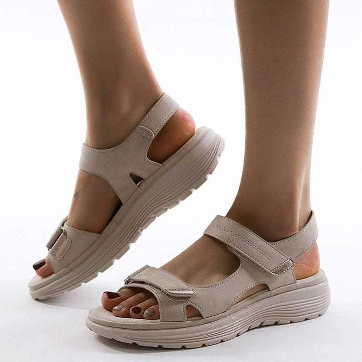 Orthopaedic walking sandals with arch support styled for casual summer wear with adjustable straps and open-toe design