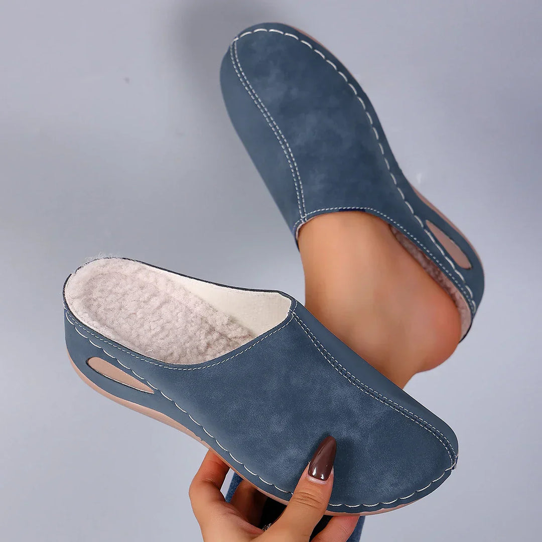 Women's Orthopaedic Cozy Slippers in blue with contrast stitching and plush fleece lining for indoor comfort