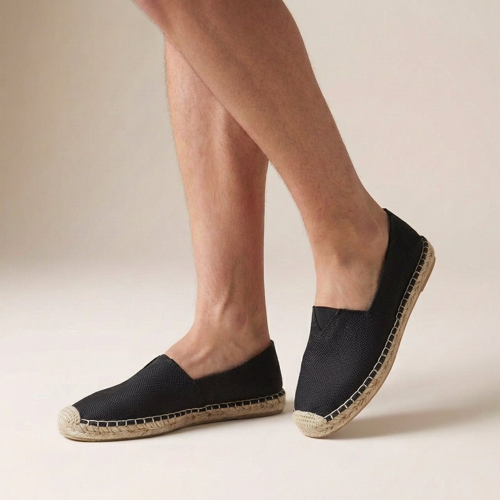 Women's Orthopedic Espadrilles Slip-On Jute Sole in black canvas with natural jute sole and rope whipstitching detail on foot
