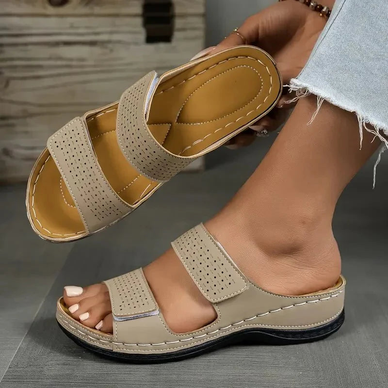 Close-up of adjustable hook-and-loop straps on women's breathable orthopaedic sandals with contoured sole design