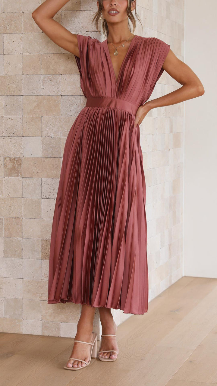 Full-length view of pleated V-neck midi dress in dusty rose for formal occasions