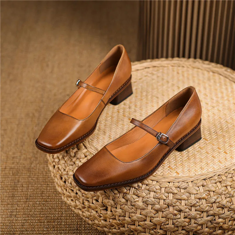 Women's strap block heel shoes in black colourway showing versatile design for work wear