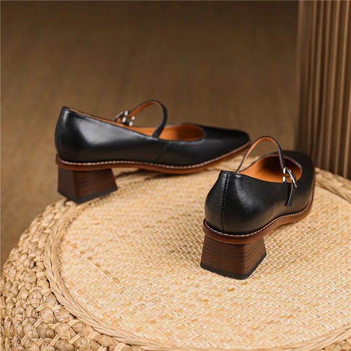 Top-down view of women's strap block heel shoes showing rounded toe shape and strap placement
