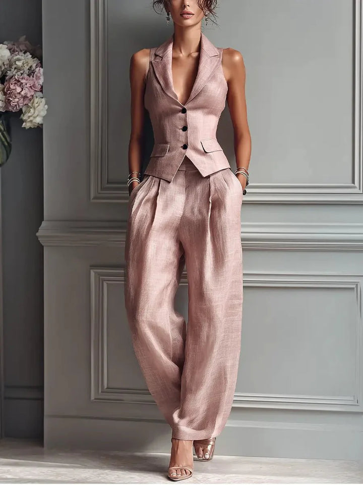 Women's two-piece suit set with sleeveless waistcoat and high-waisted wide-leg trousers in blush pink shade