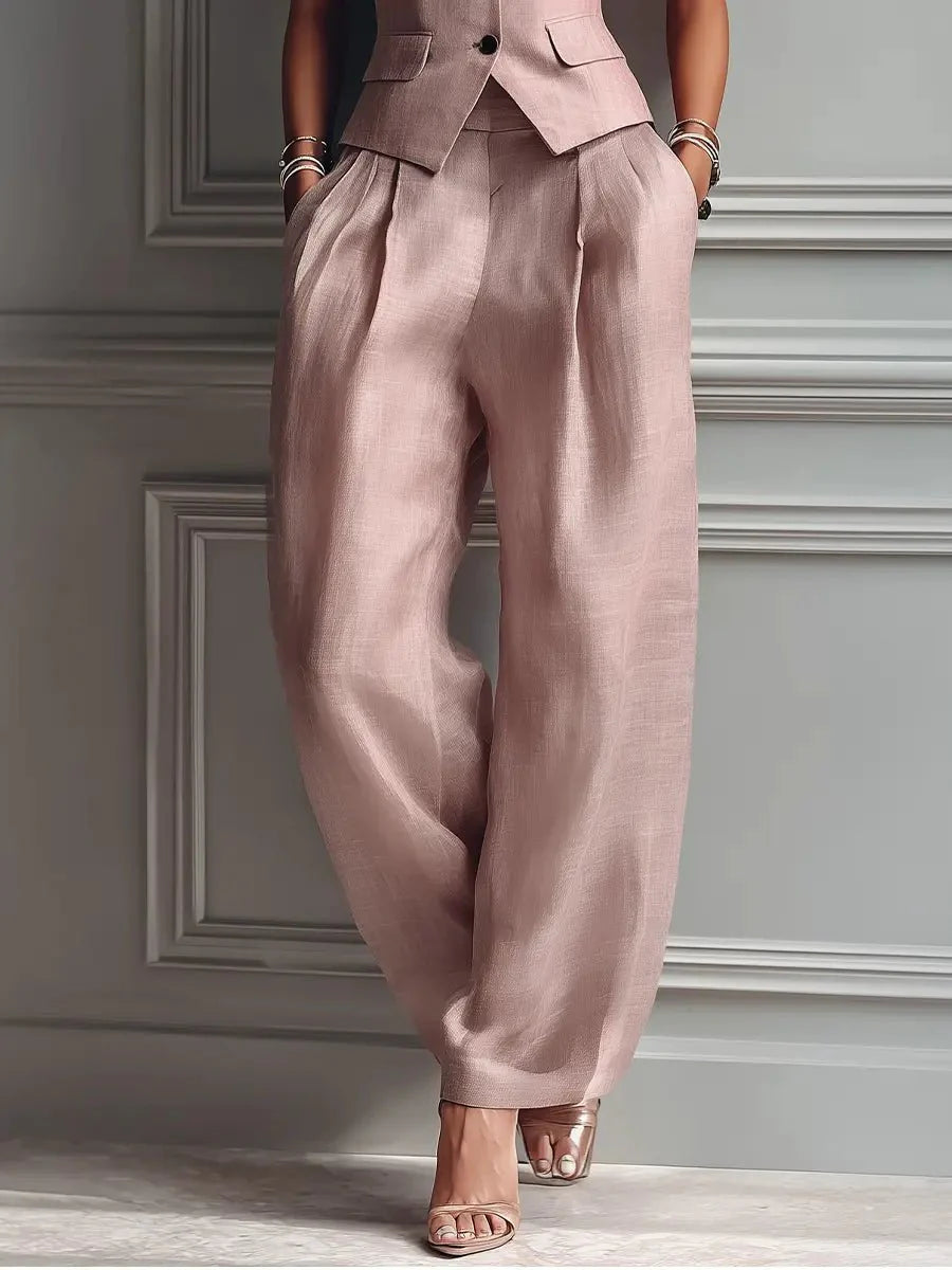 Full-length view of two-piece suit set styled with heeled sandals for formal occasions