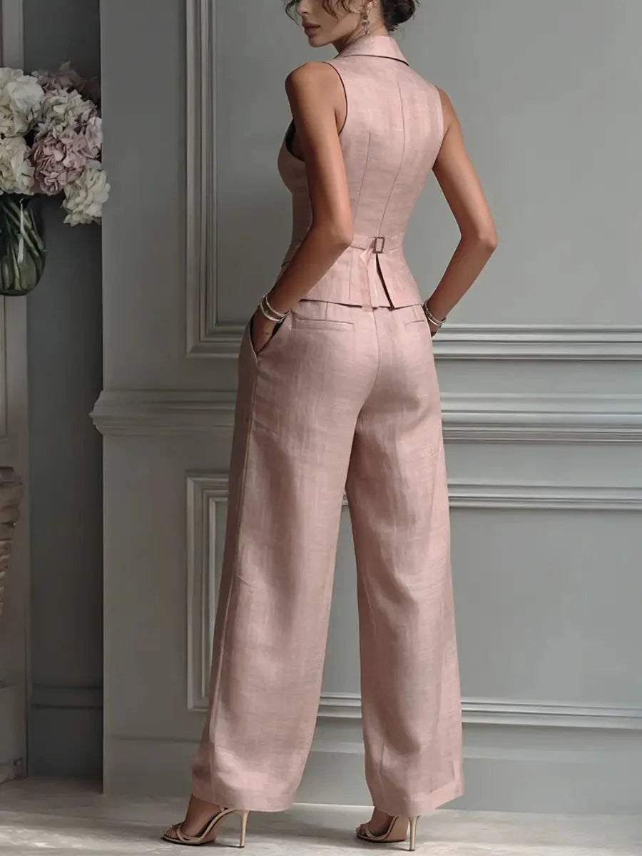 Back view of sleeveless waistcoat and wide-leg trousers showing tailored construction and fit