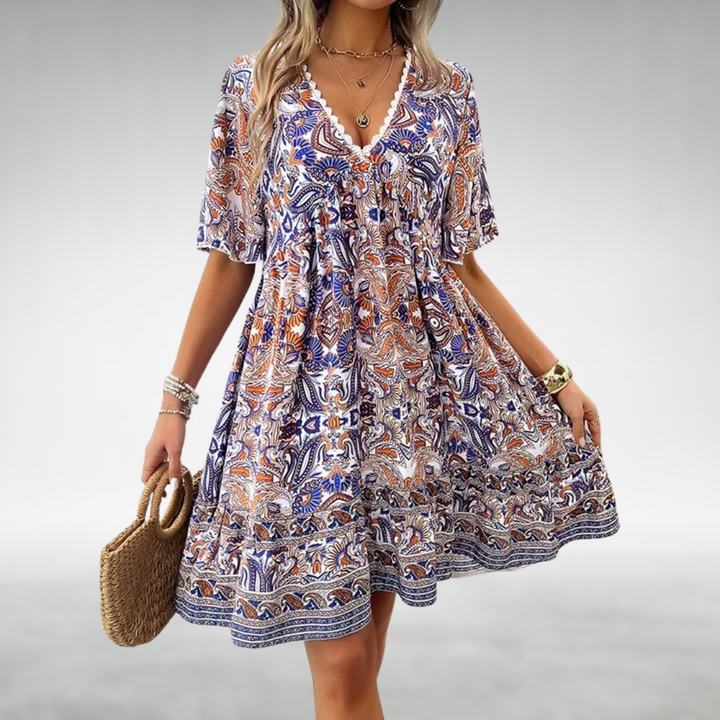 Side view of Women Summer Boho Paisley Mini Dress displaying relaxed A-line silhouette and gathered waist
